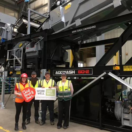 Terex Emma Mc Crudden Work Well Live Well Programme Manager at Northern Ireland Chest Heart Stroke with Terex Health Champions Chris Mullholland Joe Killen and Amanda Thompson SHEQ Officer