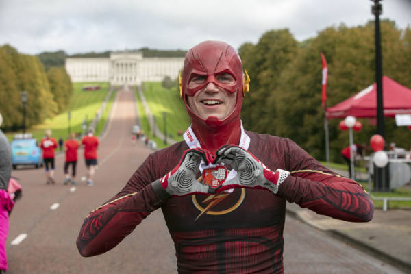Runners descend on Stormont for Northern Ireland Chest Heart and Stroke's Red Dress Run